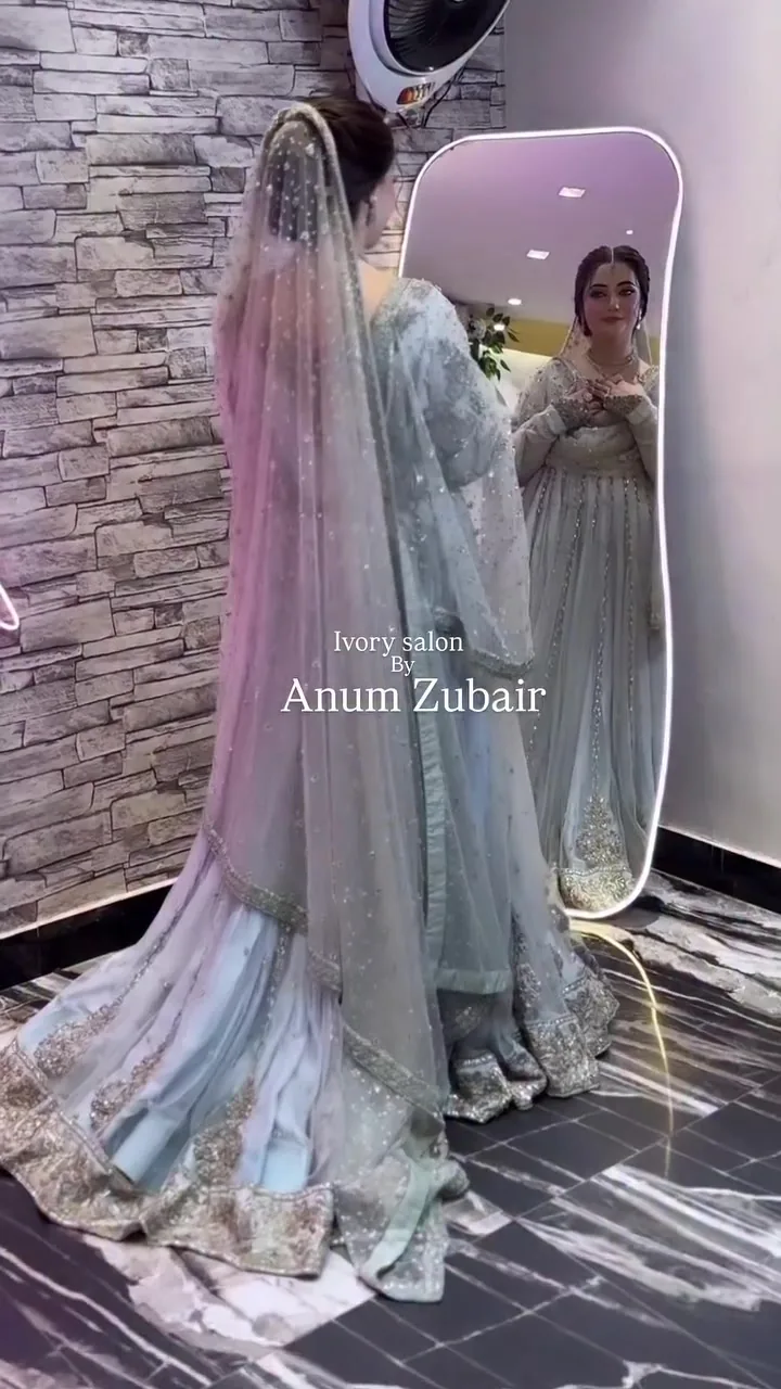 Bride review: Ice blue in the mirror, makeup by ivory salon