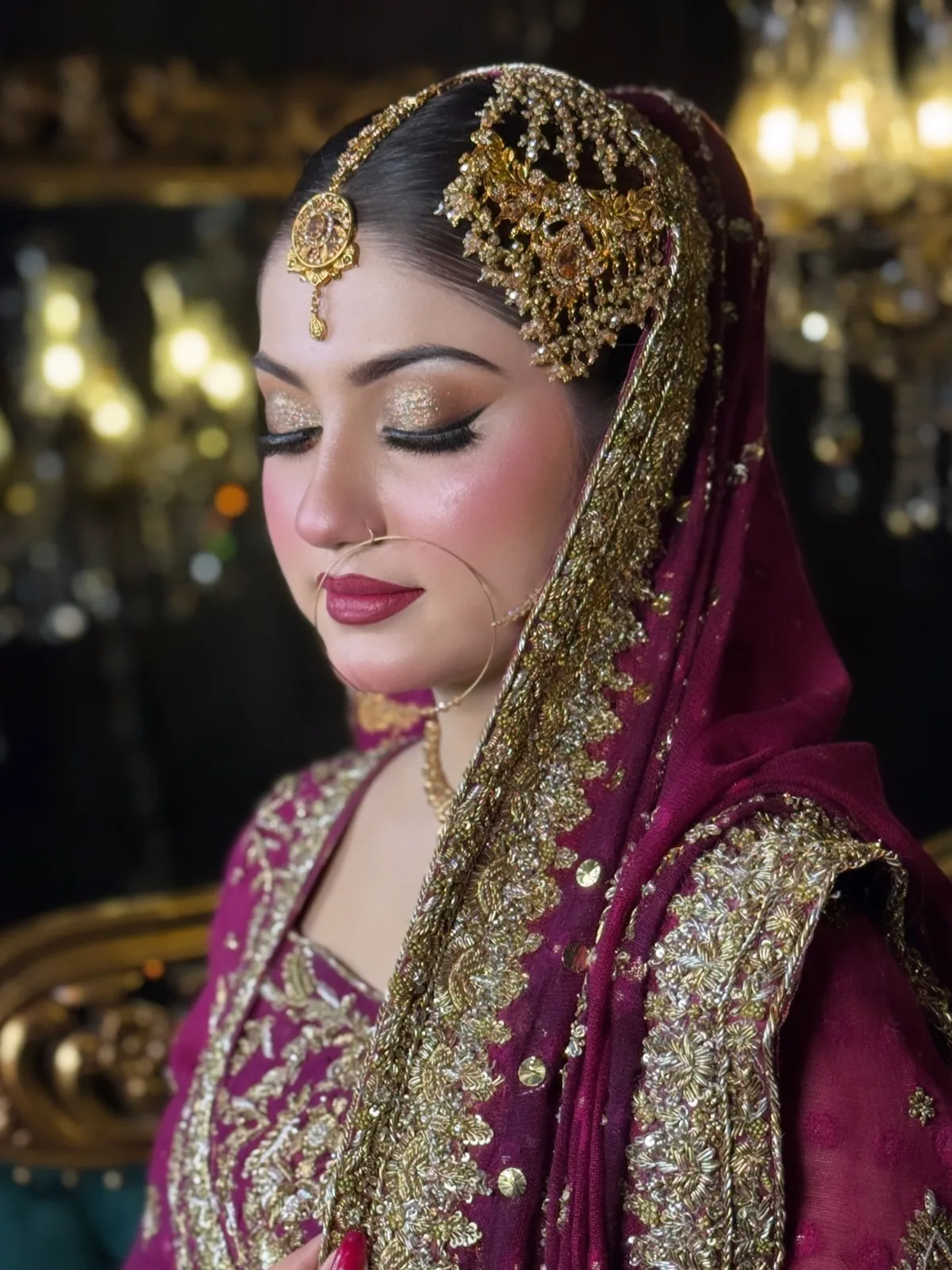 Barat: Maroon & antique gold, makeup by ivory salon